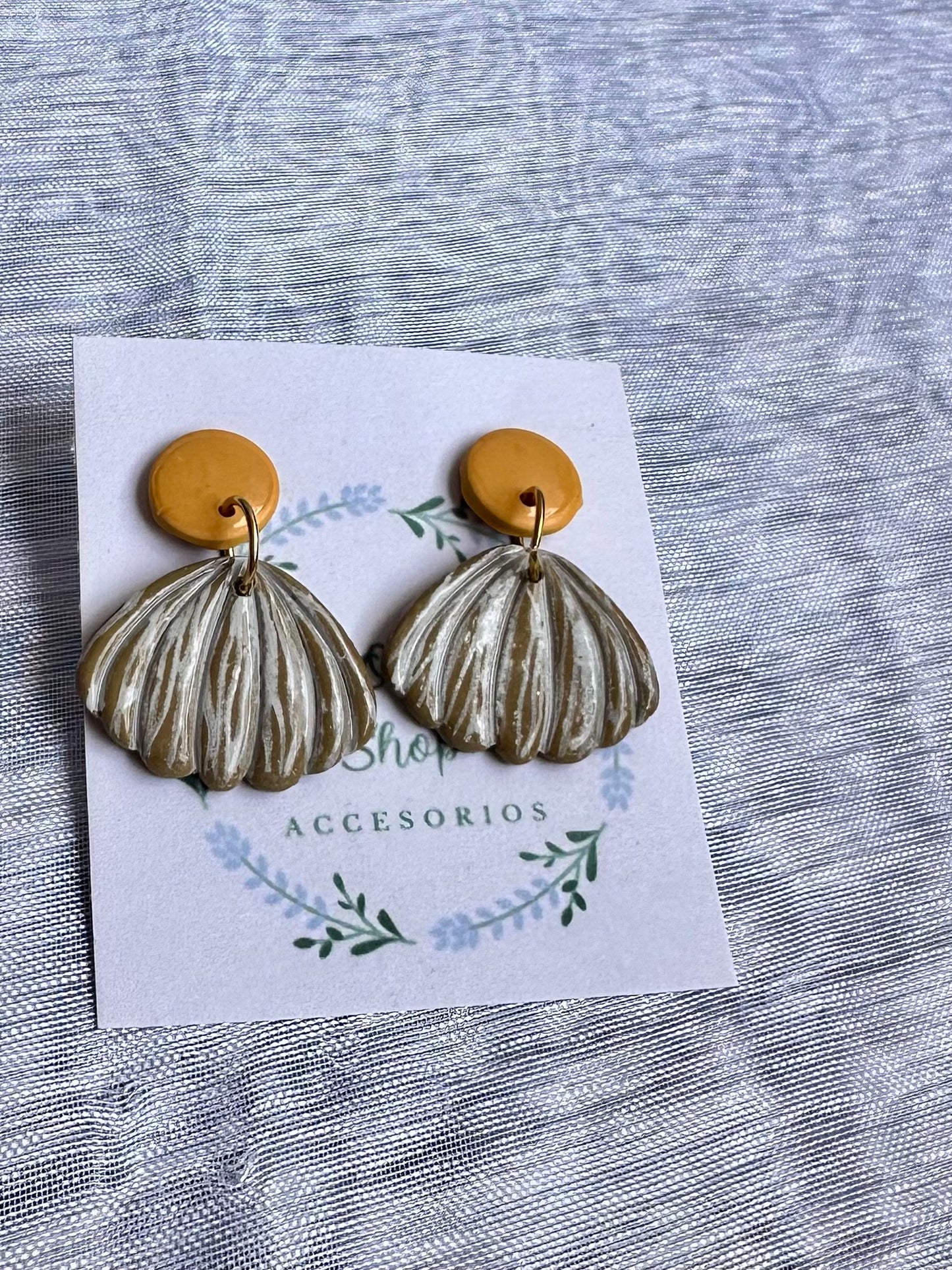 Modelo conchas arena de la colección bahía feliz