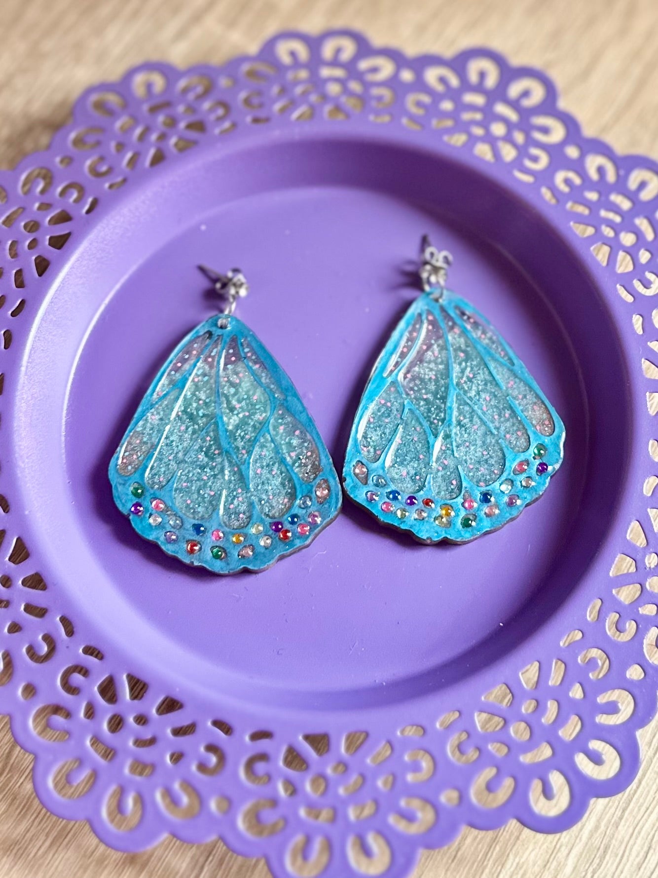 Pendientes de resina alas de mariposa