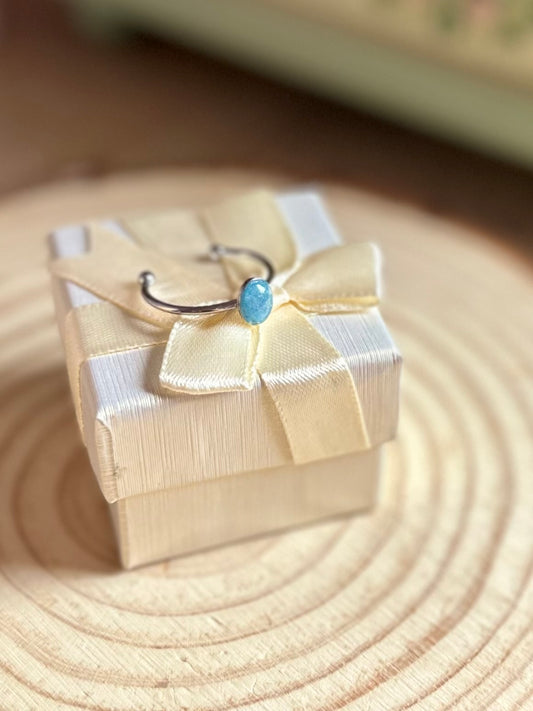Anillo pequeño celeste en plateado