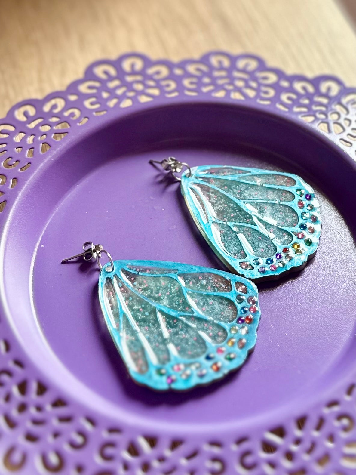 Pendientes de resina alas de mariposa