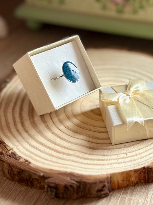 Anillo azul en plateado