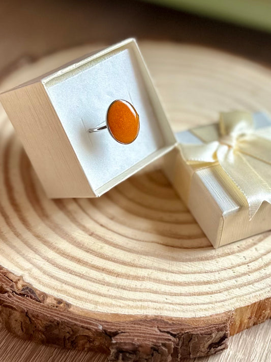 Anillo naranja en plateado